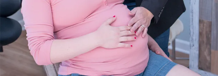 Chiropractor Hampton IL Laura Stone Adjusting Pregnant Patient Chiropractor Hampton IL Laura Stone Adjusting Pregnant Patient