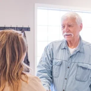 Chiropractor Hampton IL Laura Stone Talking To Patient